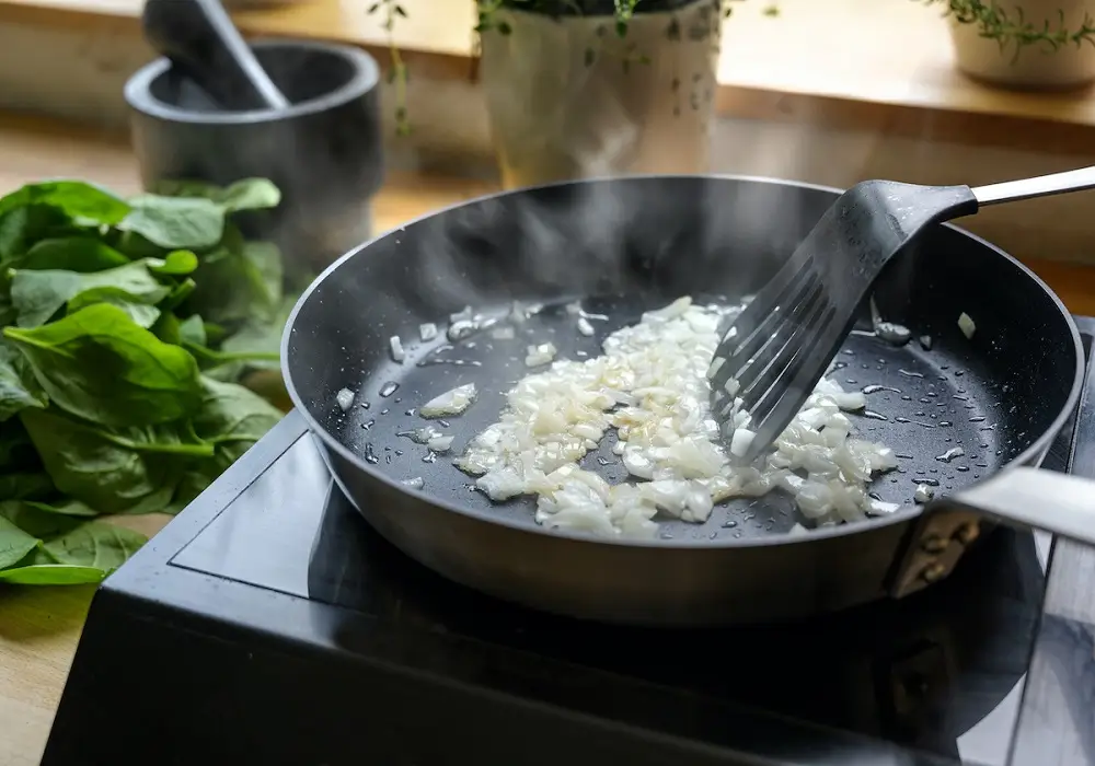The Secret to Creamy Garlic Parmesan Chicken Pasta (Easy One-Pan Recipe) 4 Sauté-Garlic-&-Onion